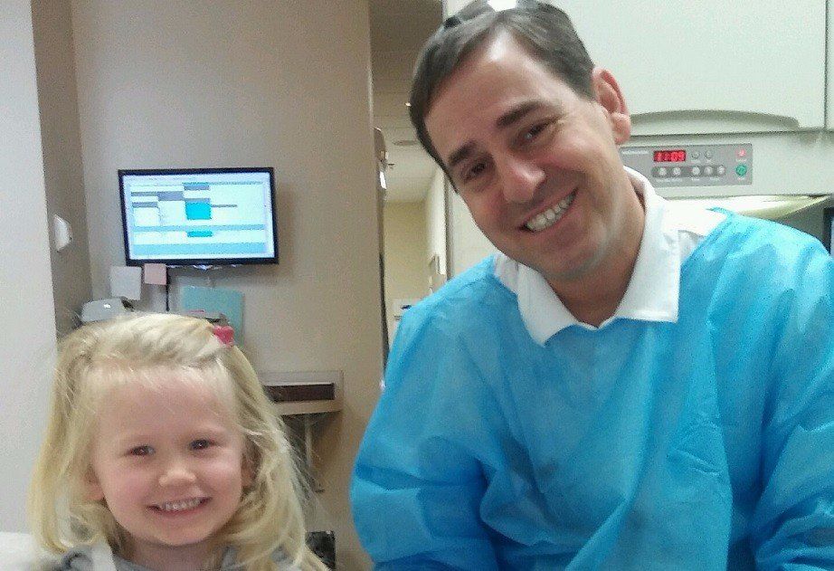 Dr. Mark Grucella with young patient